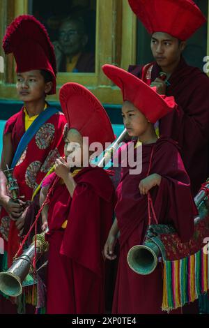 Ladakhi monks in a cultural festival playing musical instrument wearing traditional at Leh, India on 5 July 2024 Stock Photo