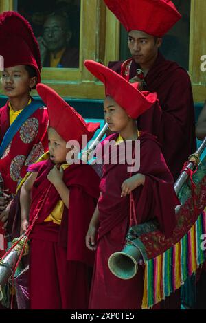 Ladakhi monks in a cultural festival playing musical instrument wearing traditional at Leh, India on 5 July 2024 Stock Photo