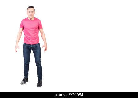 Shocked man in light studio. White background Stock Photo