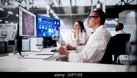 Engineer Operators Using Scada System At Industrial Plant Stock Photo