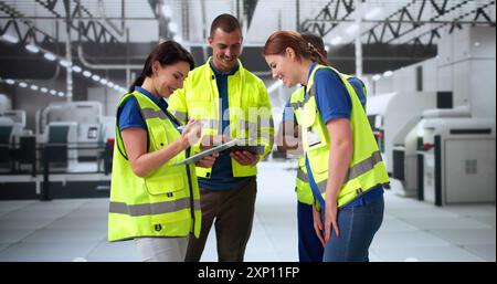 Factory Worker Osha Inspection Using Tablet Computer Stock Photo