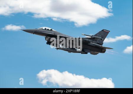 An F-16 Aggressor assigned to the 706th Aggressor Squadron takes off for Red Flag-Nellis 24-2 mission at Nellis AFB, Nevada, March 13, 2024. During Re Stock Photo