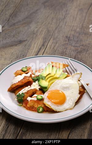 chilaquiles with salsa roja, Mexican breakfast Stock Photo