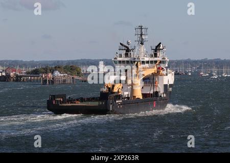 The multi purpose offshore auxiliary ship SD NORTHERN RIVER making its way up harbour towards a berth in the Naval Base Stock Photo