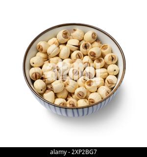 Bowl with dried Lotus seed isolated on white background close up Stock Photo