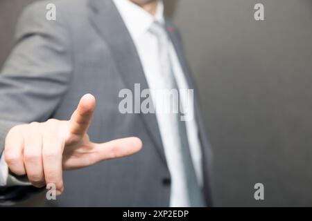 Businessman touching concepts in studio. Business Man pushing on a touch screen interface Stock Photo