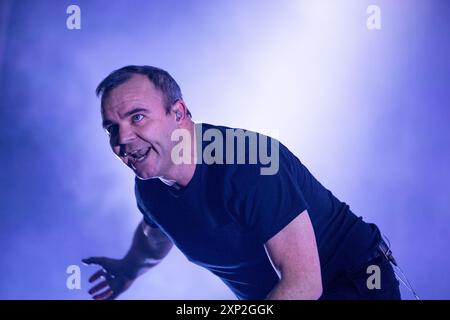 Sam Herring, vocalist and frontman with Future Islands, on stage at Bearded Theory festival, Derbyshire, May 2024 Stock Photo