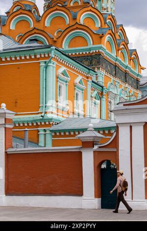 A man passing the church of Gregory Thaumaturgus (Gregory the Miracle-Worker or Gregory of Neocaesarea) in Moscow, Russia Stock Photo