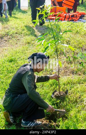 Indonesian people is planting plants to green the land Stock Photo