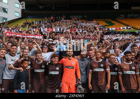 St Pauli players pose for a photo with the fans after the teams victory