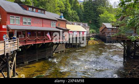 Buildings in the historic Creek Street area look out on Ketchikan Creek, which flows through the middle of the popular tourist destination. Stock Photo