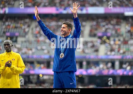 Paris, France. 03rd Aug, 2024. PARIS, FRANCE - AUGUST 3: Grant Fisher of USA winner of the brons medal during the medal ceremony after competing in the Men's 10000m Final during Day 8 of Athletics - Olympic Games Paris 2024 at Stade de France on August 3, 2024 in Paris, France. (Photo by Andy Astfalck/BSR Agency) Credit: BSR Agency/Alamy Live News Stock Photo