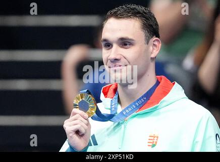 Paris, France. 03rd Aug, 2024. Kristof Milak of Hungary holds his gold medal after winning the Men's 100m Butterfly at the Paris 2024 Olympics at the Arena Le Defense in Paris, France on Saturday, August 3, 2024. Photo by Richard Ellis/UPI Credit: UPI/Alamy Live News Stock Photo