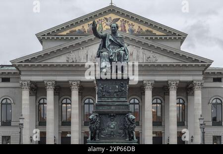 Munich, Germany - Dec 21, 2023 - Monument Bronze Statue of King Maximilian I Joseph of Bavaria in front of The National Theatre of Munich (Nationalthe Stock Photo