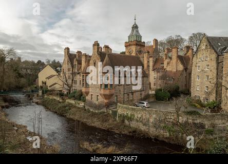 Edinburgh, Scotland - Jan 16, 2024 - Well Court is a traditional old Tenement building in Dean Village with river and stream which sits along the bank Stock Photo