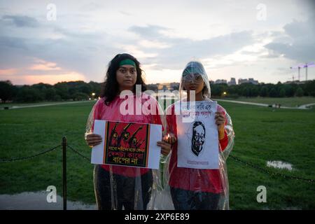 Washington DC, USA. 3rd Aug 2024. The Bangladeshi community holds a candlelight vigil on August 03, 2024, in the National Mall, Washington DC, USA to support the Anti-Discriminatory Students Movement in Bangladesh. They condemned the government for killing innocent and underage students. From the vigil, they also demanded to step down current prime minister Sheikh Hasina, who has been in power since 2009. At first, the student movement was started to reform the country's quota system for Gov. Credit: Aashish Kiphayet/Alamy Live News Stock Photo