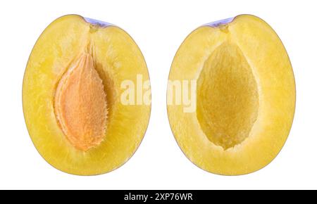 Two halves on a plum fruit with and without kernel isolated on white background Stock Photo