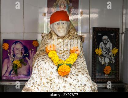 MUMBAI - SEP 20: Figure of Sai Baba of Shirdi on altar at local temple in Mumbai on September 20. 2023 in India. He was an Indian spiritual master and Stock Photo