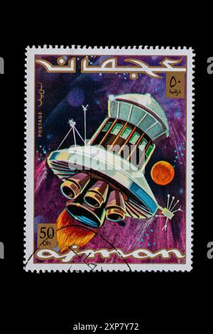 Space Exploration Postage stamps from Ajman 1971. Futuristic design of what a spacecraft might look like. Stock Photo