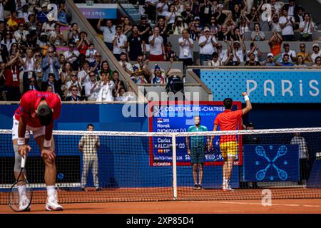 Paris, France. 04th Aug, 2024. Carlos Alcaraz of Spain celebrates winning long rally with Djokovic disappointed during the mens singles tennis final between Novak Djokovic of Serbia and Carlos Alcaraz of Spain during the Olympic Games Paris 2024 at Court Philippe Chatrierat, Roland Garros, Paris, France. (Richard Callis/SPP) Credit: SPP Sport Press Photo. /Alamy Live News Stock Photo