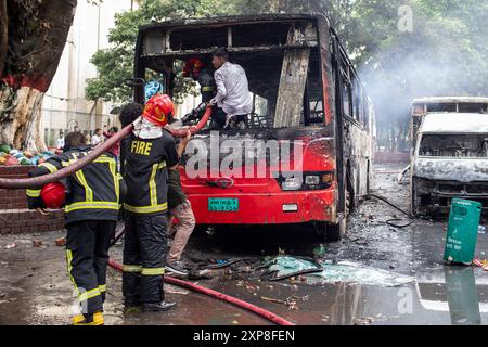 A Bangladeshi firefighters work to douse a fire at the Bashundhara City ...