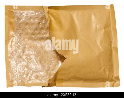 A fragment of an envelope made of brown paper with bubble wrap inside. Package for transporting corresponden Stock Photo