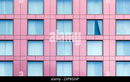 Travel Background Of A Modern Contemporary Hotel Windows With The Curtains Open In One Window Stock Photo