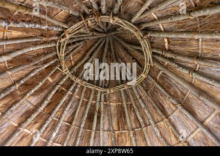 Inside the thatched roundhouse in the Arundel Castle Gardens, Arundel, West Sussex, UK: roof detail interior Stock Photo