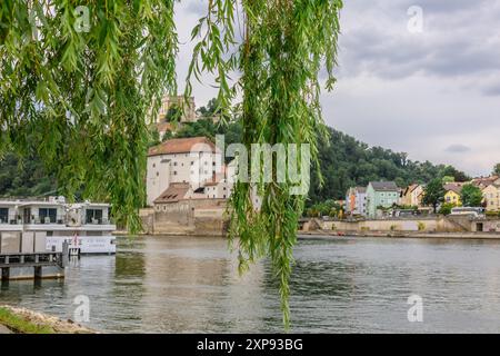 Passau, Germany - July 21, 2023: Panoramic view of Passau. Confluence of three rivers Danube, Inn, Ilz, Bavaria, Germany. High quality photo Stock Photo