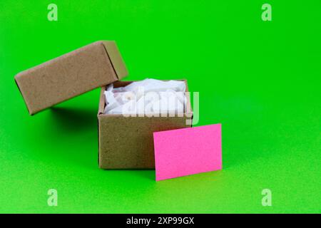 Handmade gift box with pink card Stock Photo