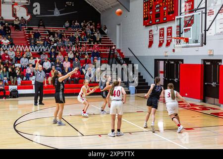 A Blackhawk Christian player shoots a free throw during an IHSAA girls basketball game at Adams Central High School in Monroe, Indiana, USA. Stock Photo