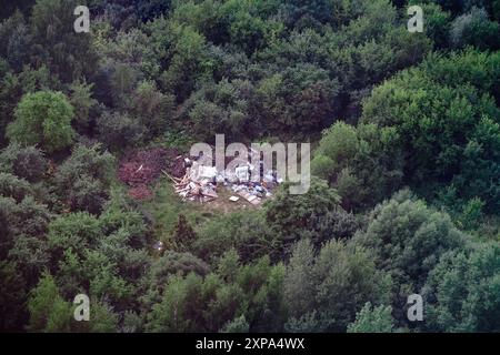 panorama illegal garbage dump in the forest Stock Photo - Alamy