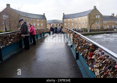 Thousands of lovelocks attached to Weir Bridge at Bakewell in Derbyshire. The council have said they need to remove them to repair the bridge in 2024 Stock Photo