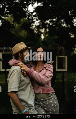 A middle-aged couple in love hugging. Stock Photo
