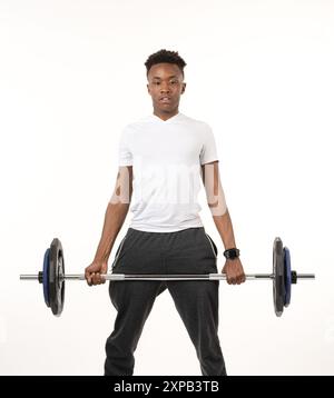 black man does squats on white Stock Photo
