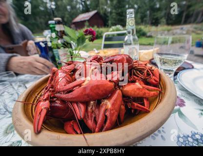 Freshly cooked crayfish on a set table Stock Photo