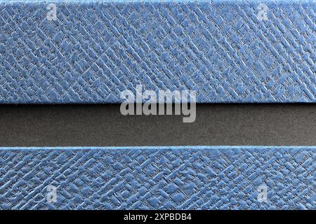 Close up blue synthetic textile, synthetic texture use on premium Packaging. Stock Photo