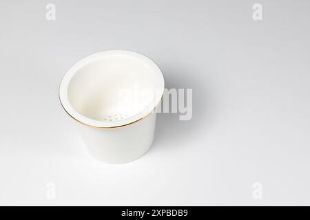 Chinese traditional Ceramic tea strainer cup for make classic tea in Chinese style isolated in white background. Stock Photo