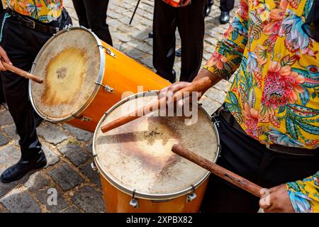 Drummers and their instruments performing during a typical street party ...