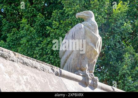 A stone vulture on Animal Walk, Bute Park, Cardiff UK. Sculpture in 1880s by William Frame to the designs drawn by William Burges. Stock Photo