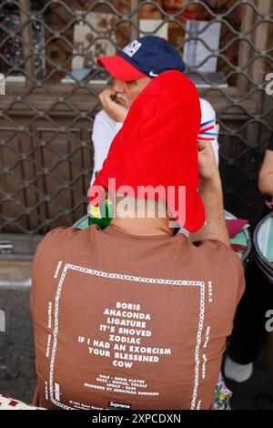 FRENCH OLYMPIC GAMES FAN WEARING OLYMPIC PHRYGE ON A TERRACE IN PARIS Stock Photo