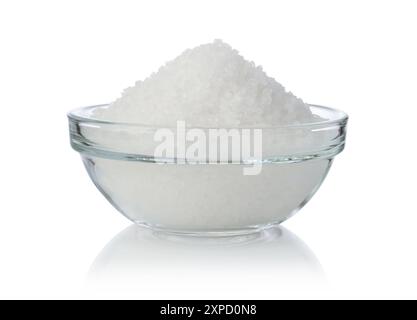 Coarse table salt in a glass bowl isolated on white. Stock Photo