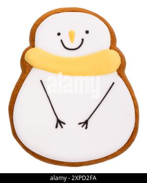 Christmas themed iced gingerbread cookie  shaped as snowman isolated on white background Stock Photo