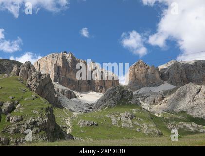 view of the arrival of the cable car above the mountain called SASS Pordoi in the Italian Dolomites in northern Italy in the European Alps in summer Stock Photo