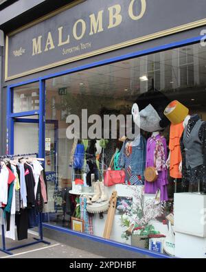 Frontage of Malombo charity shop in West London, in the North End Rd Stock Photo