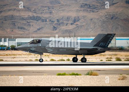 An F-35B Lightning II assigned to Marine Fighter Attack Squadron (VMFA) 542, Marine Corps Air Station Cherry Point, North Carolina, taxis prior to taking off for a mission during Red Flag-Nellis 24-3, at Nellis AFB, Nevada, July 30, 2024. Red Flag provides participants the opportunity to plan and employ together in the air, domain (supported by space, and cyber) in a contested, degraded and operationally limited environment. Stock Photo