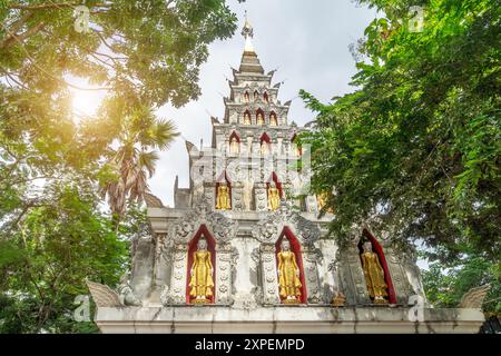 The White Pagoda in a Buddhist Temple, Xishuangbanna, Southern Yunnan Province, China Stock Photo