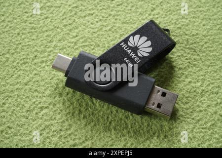 Terengganu, Malaysia - 23 August 2024 : Closeup of Huawei otg dual drive on green background. Usb-A and usb-C flash drive. Stock Photo