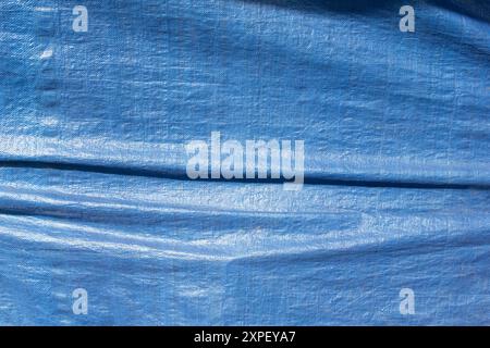 A view of a blue tarp, as a background. Stock Photo