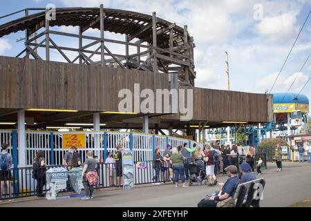 Puyallup, Washington, United States - 09-13-2021: A view of a long line to ride a thrill ride, seen at the Washington State Fair. Stock Photo